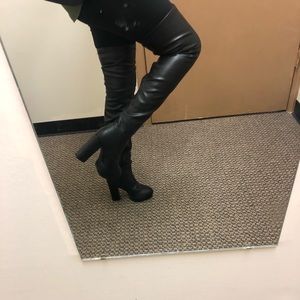 Black thigh high heel boot